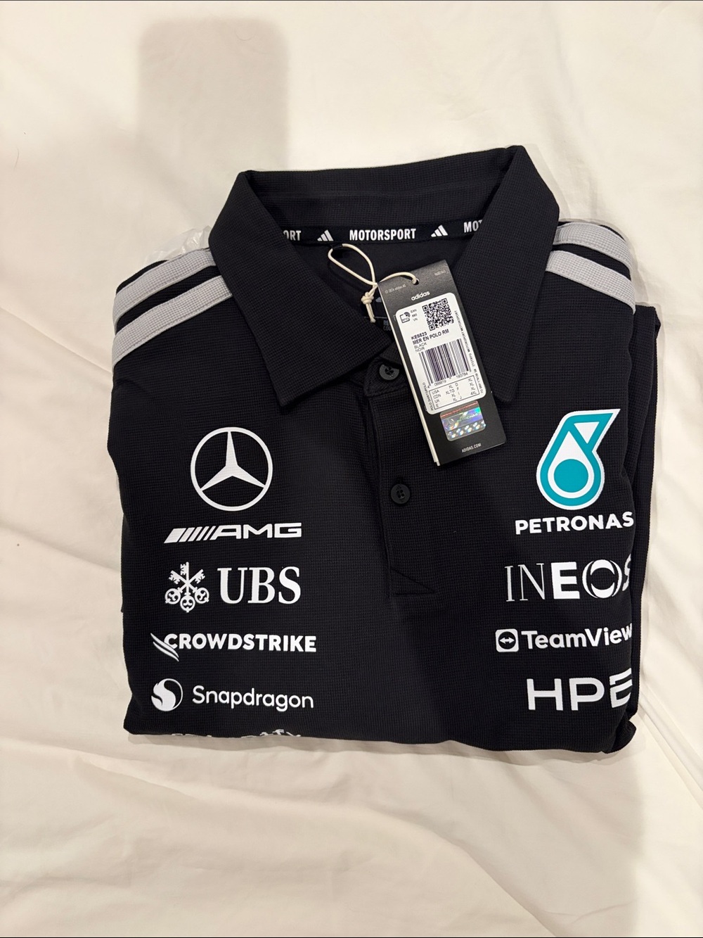 Mercedes AMG Petronas Black Polo with Teal Petronas Badge